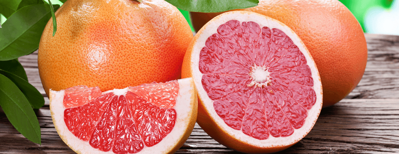 Fresh grapefruits showing how many calories are in a grapefruit